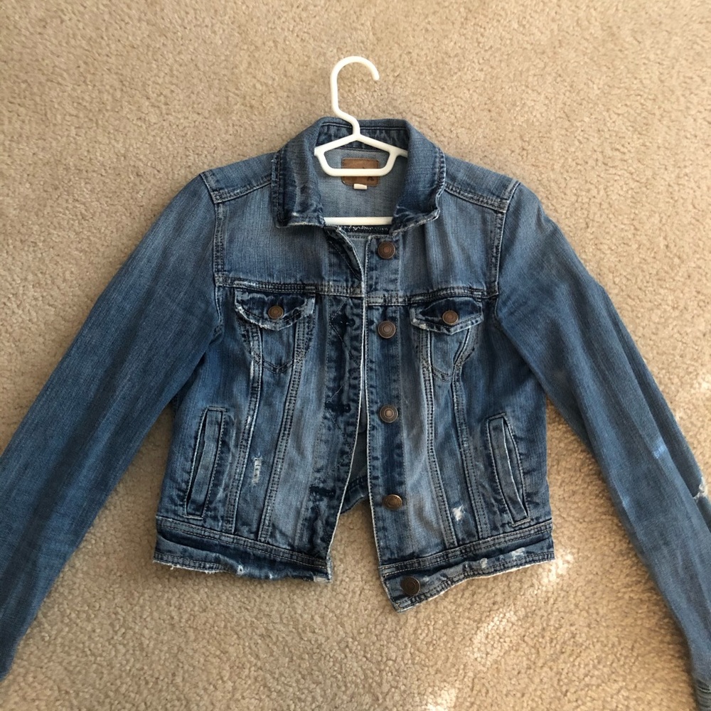 Distressed jean jacket